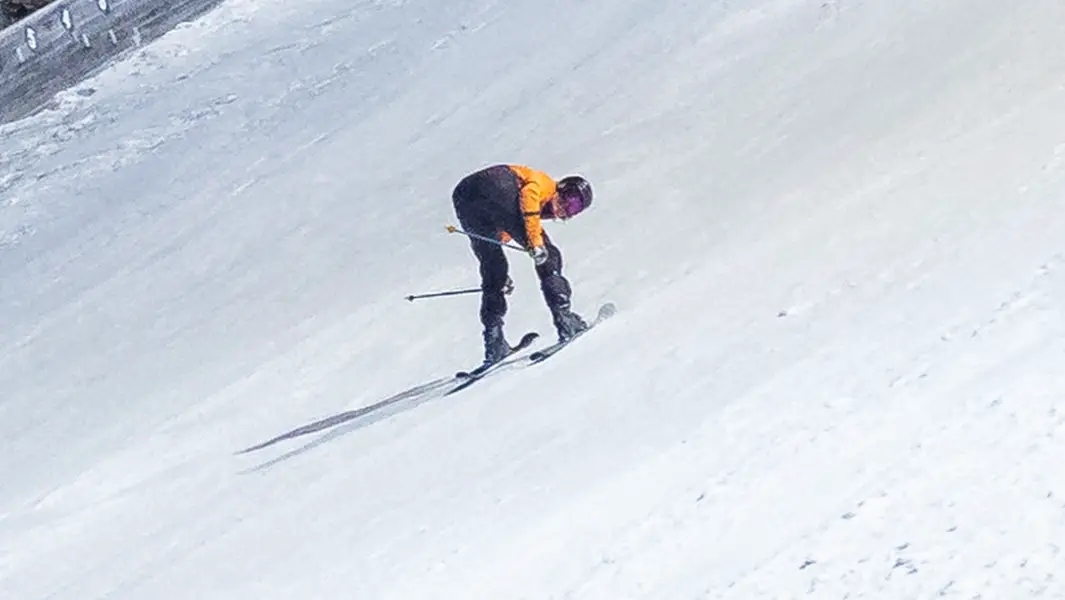 Pro skier reaches record-breaking 82-mph speed skiing backwards downhill 