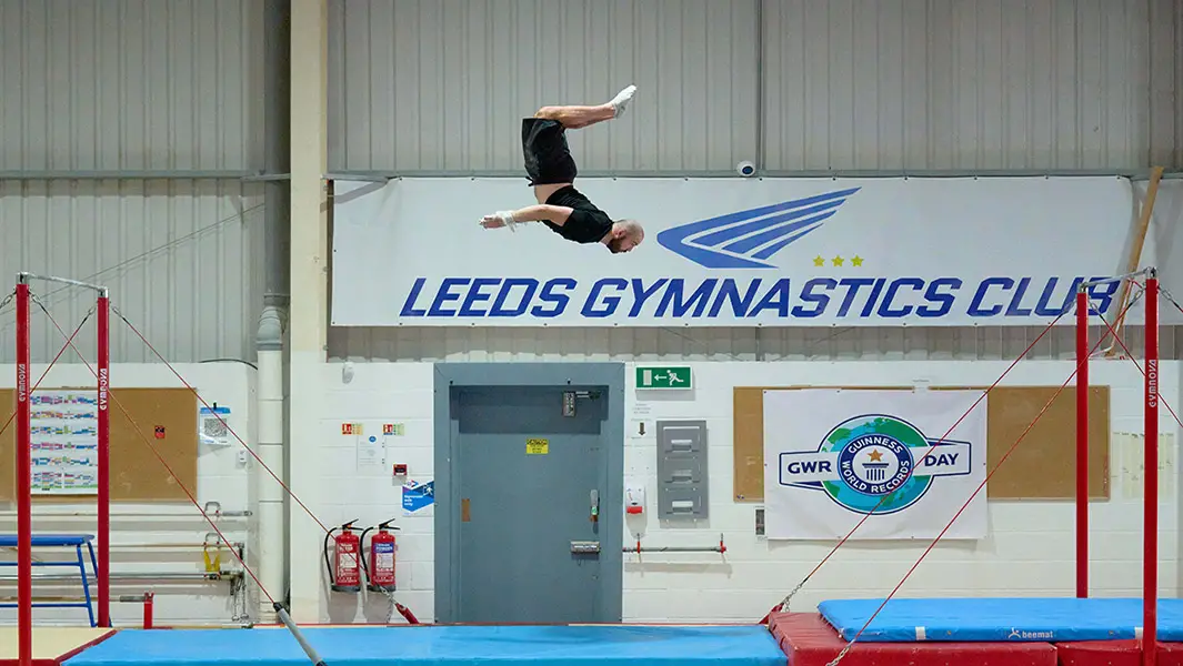 Gymnast breaks record with epic six-metre backflip between bars