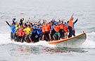 World's largest surfboard: 66 catch a wave and ride their way to a record - video