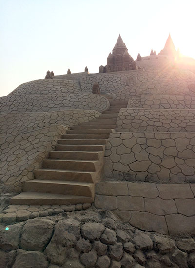 Steps going up the tallest sandcastle