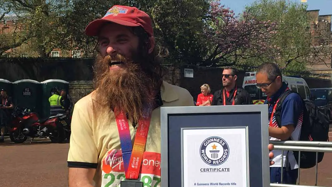 Man dressed as Forrest Gump leads home 34 record breakers at Virgin Money London Marathon