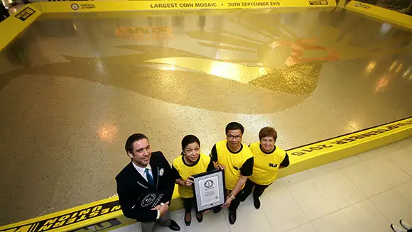 Western Union celebrates anniversary by creating huge coin mosaic