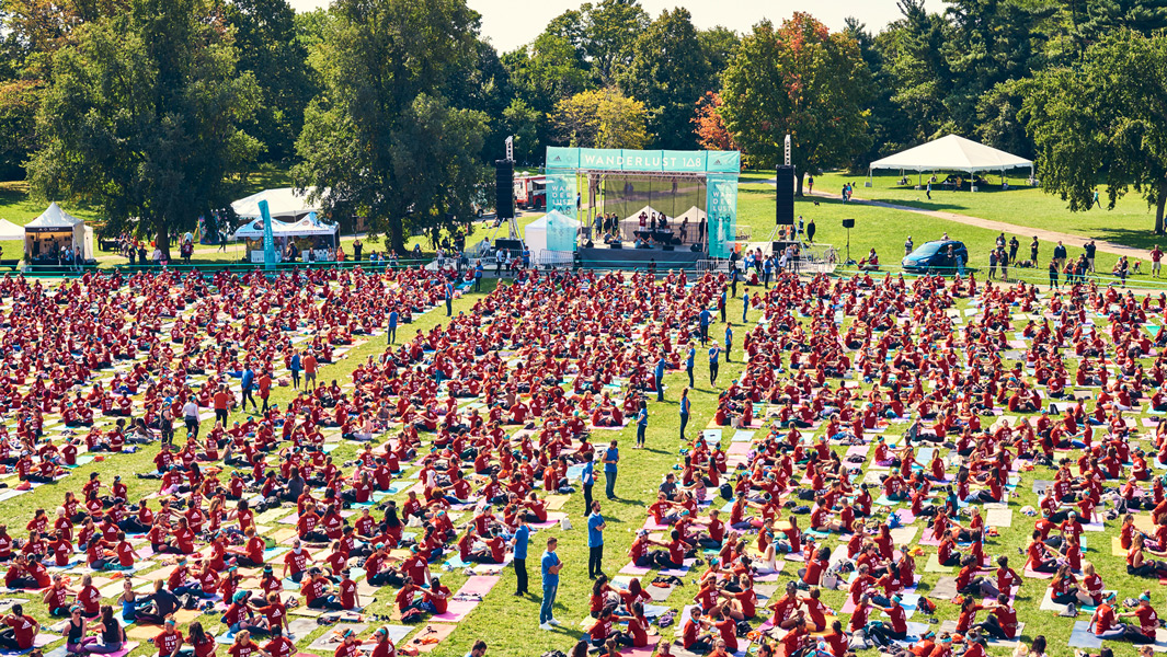Most people doing yoga in pairs