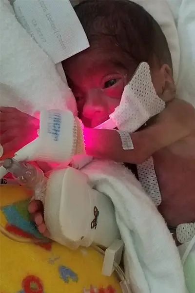 Adiah opening her eyes for the first time