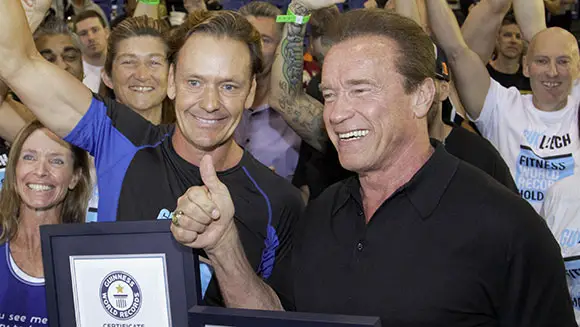 Arnold Schwarzenegger honoured during fitness lesson record attempt in Australia