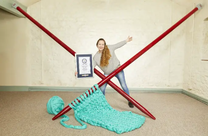 Betsy Bond set a Guinness World Record for the World's Largest Knitting Needles in 2018