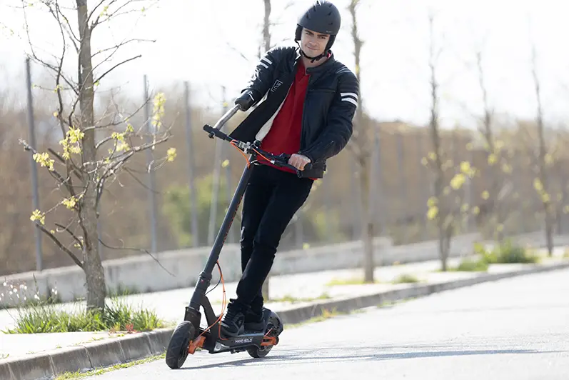 David aguilar riding a scooter