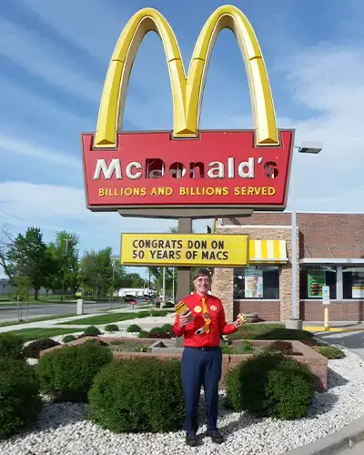 Donald Gorske with mcdonalds sign
