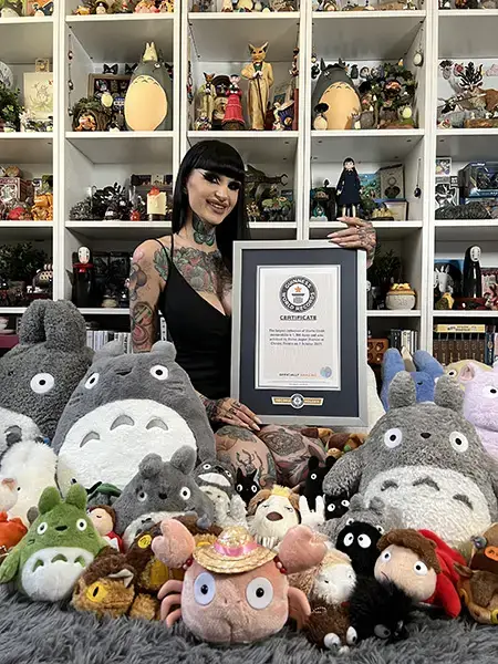 Eloise with cert and plushies