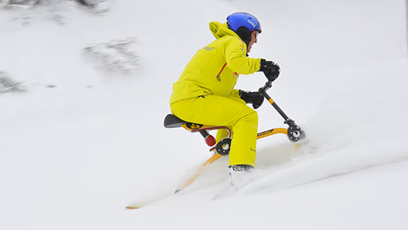 Video: Ski instructor reverses snowbike down mountain in perilous record challenge