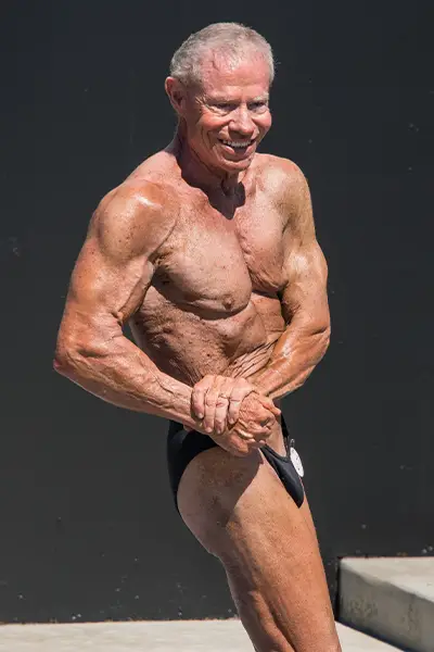 https://www.guinnessworldrecords.com/Images/Jim-Arrington-flexing-his-muscles_tcm25-755633.jpg