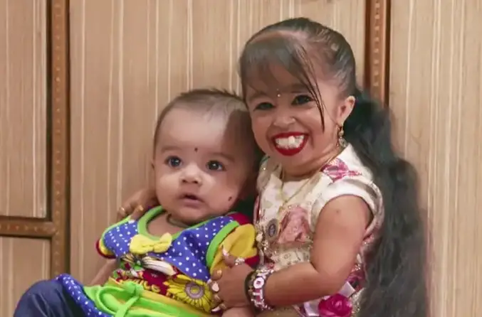 Jyoti with a baby