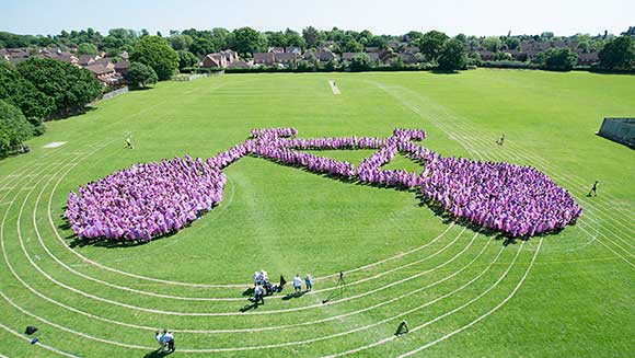 Warwickshire kids create largest human image of a bicycle ahead of local cycling race