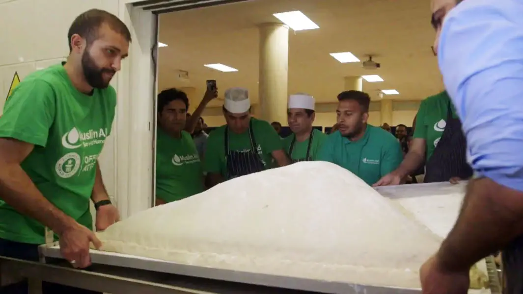 Video: Muslim Aid makes world’s largest samosa in London to feed local homeless