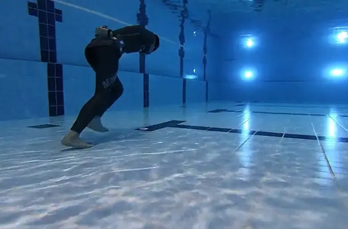Longest underwater walk with one breath underwater shot