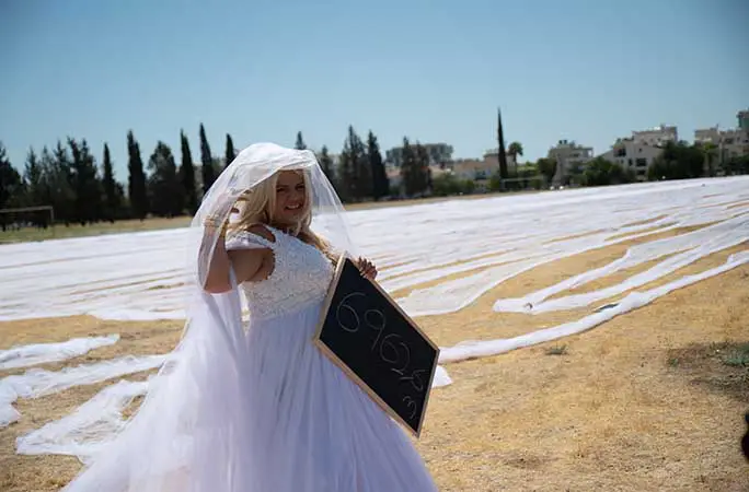 Bride's dream comes true with wedding veil that's longer than 63