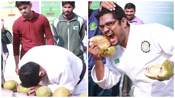 Video: Martial arts pro smashes coconuts with his head in fierce world record attempt
