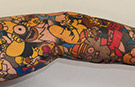In pictures: Simpsons fan sets cartoon character tattoo record with Homer tribute
