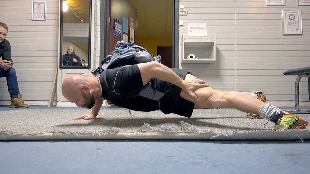 Video: Norwegian teacher smashes one arm push ups record - wearing 100-lb pack!