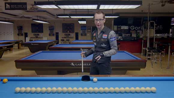 Record holder tutorial: Pool trick shot pro Florian Kohler shows you how to execute a jump shot