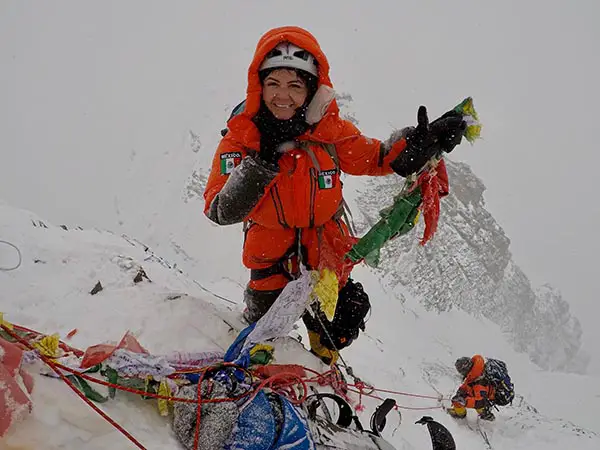 Viridiana smiling as she climbs Lhotse, the fourth-tallest mountain in the world