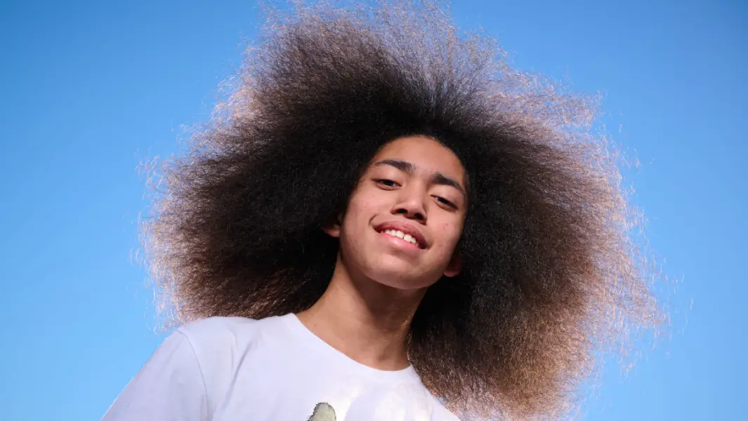 Teen with world's biggest afro says everyone should embrace what makes them unique