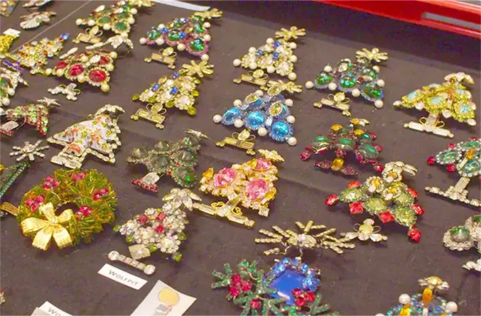 details of the Christmas trees brooches