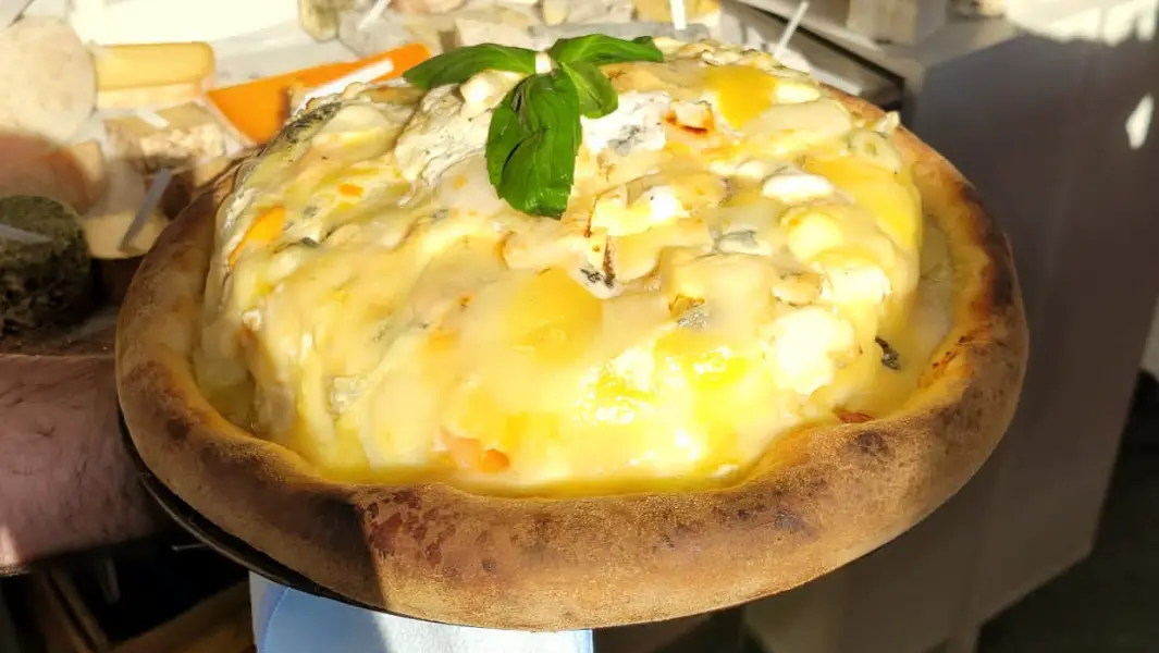 French chefs create pizza with 834 different cheeses breaking record 