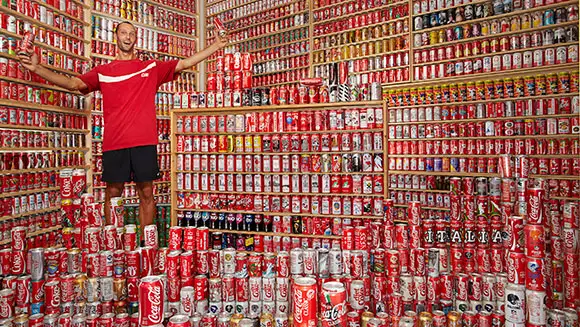 Coca Cola superfan Davide Andreani's world-beating can collection featured in Guinness World Records 2015