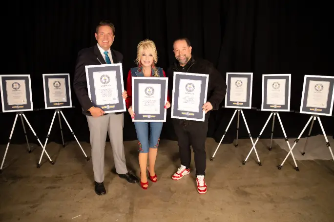Dolly Parton with Official Adjudicator Michael Empric and Manager Danny Nozell