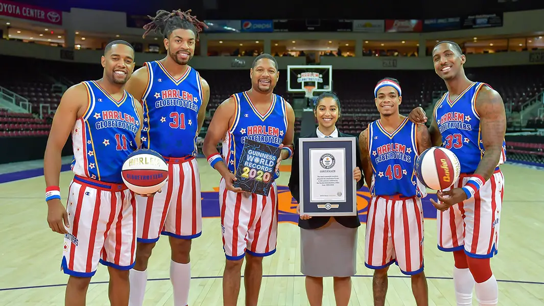 Harlem Globetrotters set six more GWR Day records with long-distance basketball shots and even more tricks
