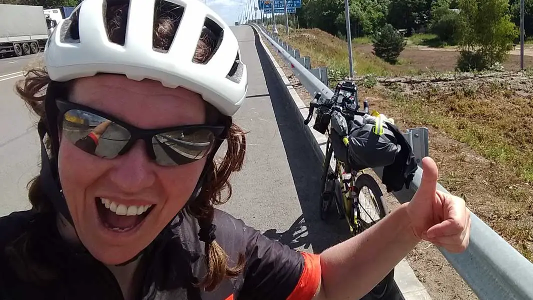 British woman cycles round the world unsupported in four months to set circumnavigation record