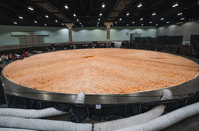 largest pizza fills the room