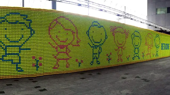 Singaporean pharmaceutical brand introduce new tennis-pro brand ambassador with enormous ball mosaic