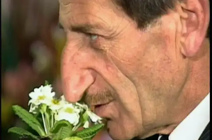 mehmet ozyurek sniffing a flower