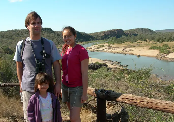With her dad, Chris, and big sister, Ayesha, on a birding trip in South Africa
