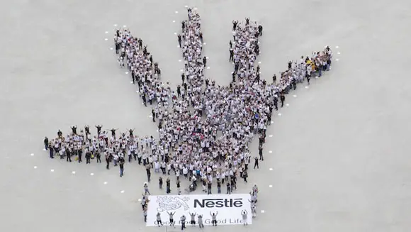 Nestle Puerto Rico Creates Largest Human Image of a Hand