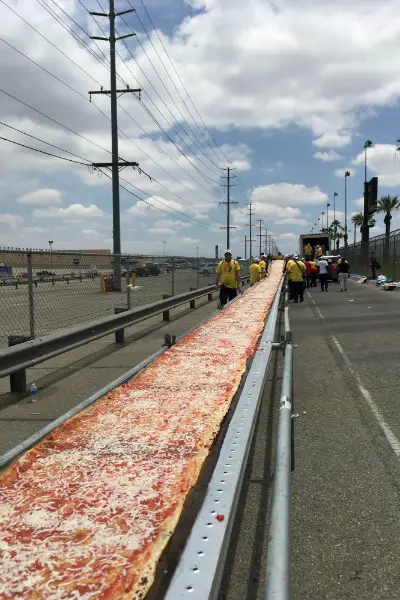 Mile Long Pizza Breaks A World Record In California Guinness World Records mile long pizza breaks a world record