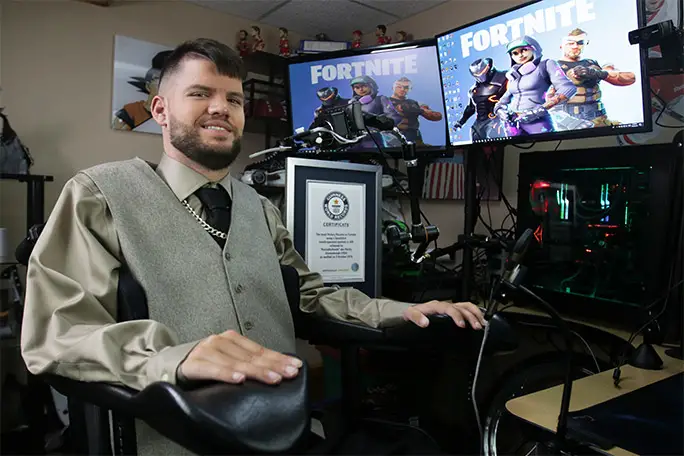 Gamer RockyNoHands has set Fortnite records using a mouth-operated-joystick