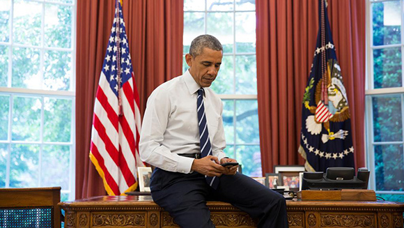 Obama sending tweet header