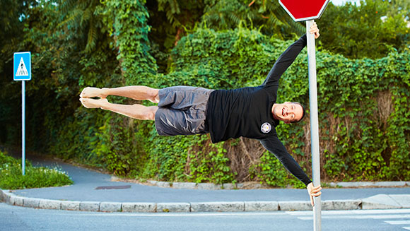 Most chin-ups in the human flag position