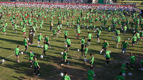 Most people keeping a football in the air header