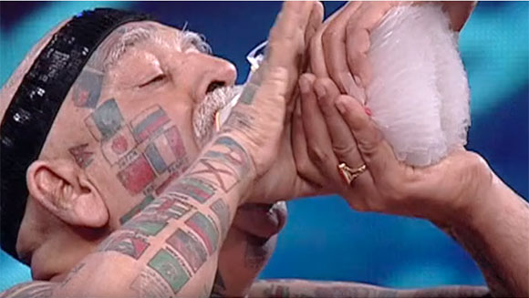 Guinness Rishi Most straws stuffed in the mouth with hands header