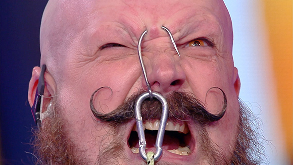Heaviest weight lifted using a hook through the forehead