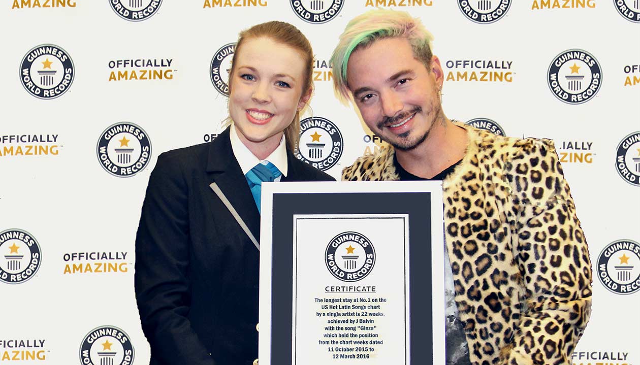GWR judge Sarah Casson presents a certificate to J Balvin