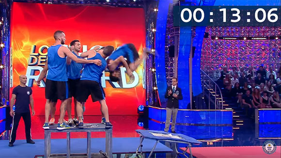 Most people to forward flip off a trampoline onto a platform