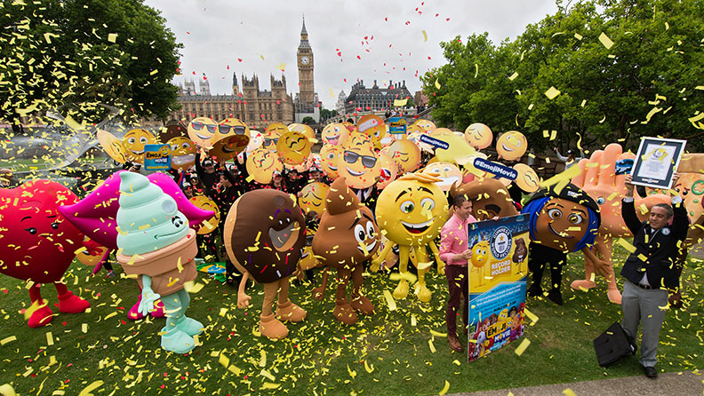 Largest gathering of people dressed as emoji faces header