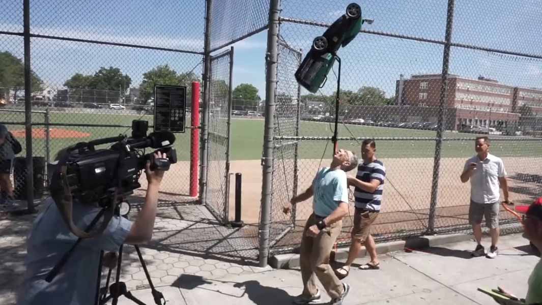 Farthest distance walked balancing a lawnmower on the chin powered header