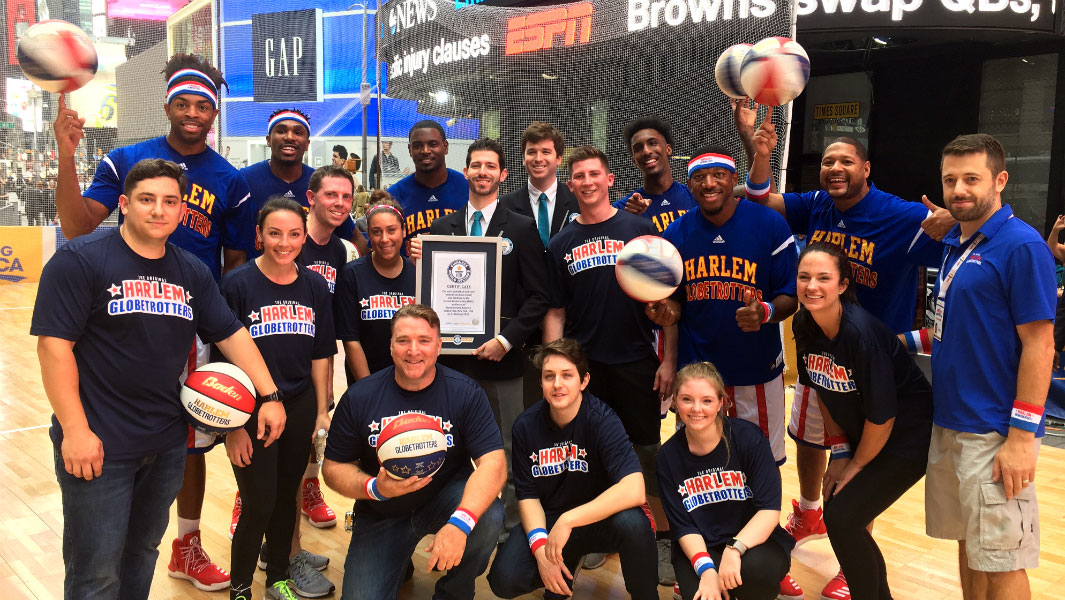 Most basketball half-court shots made in one hour (team) 4