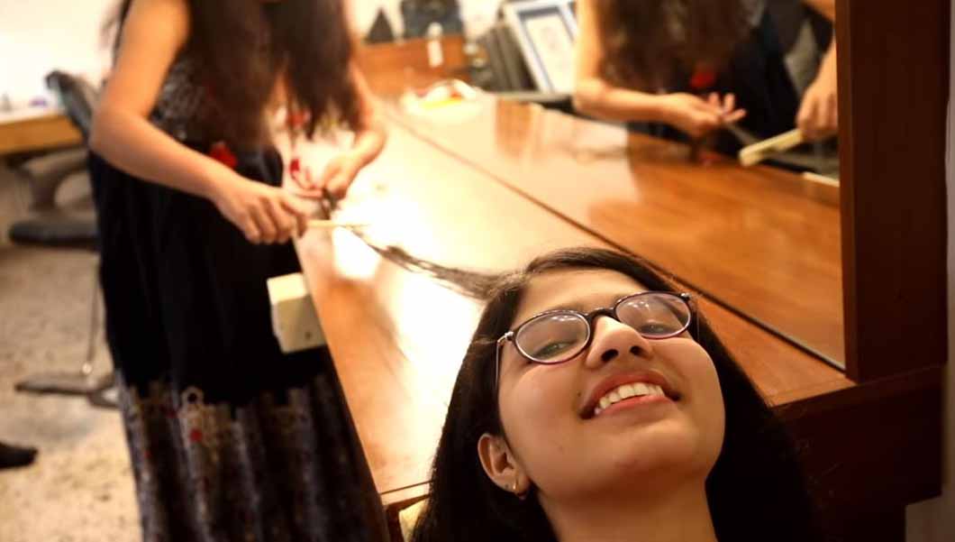 Nilanshi-Patel-having-her-hair-combed.jpg